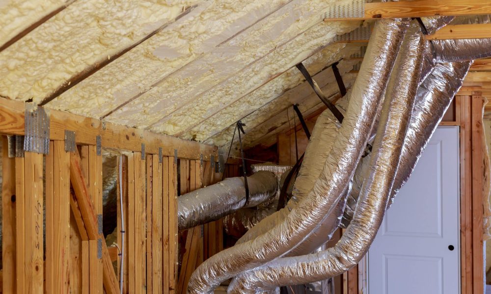 Open AC Heating Vent and Tubing in Ceiling of New Home Construction. vent pipes in attic